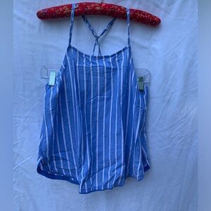 STARS ABOVE vertical striped blue and white spaghetti strap top.